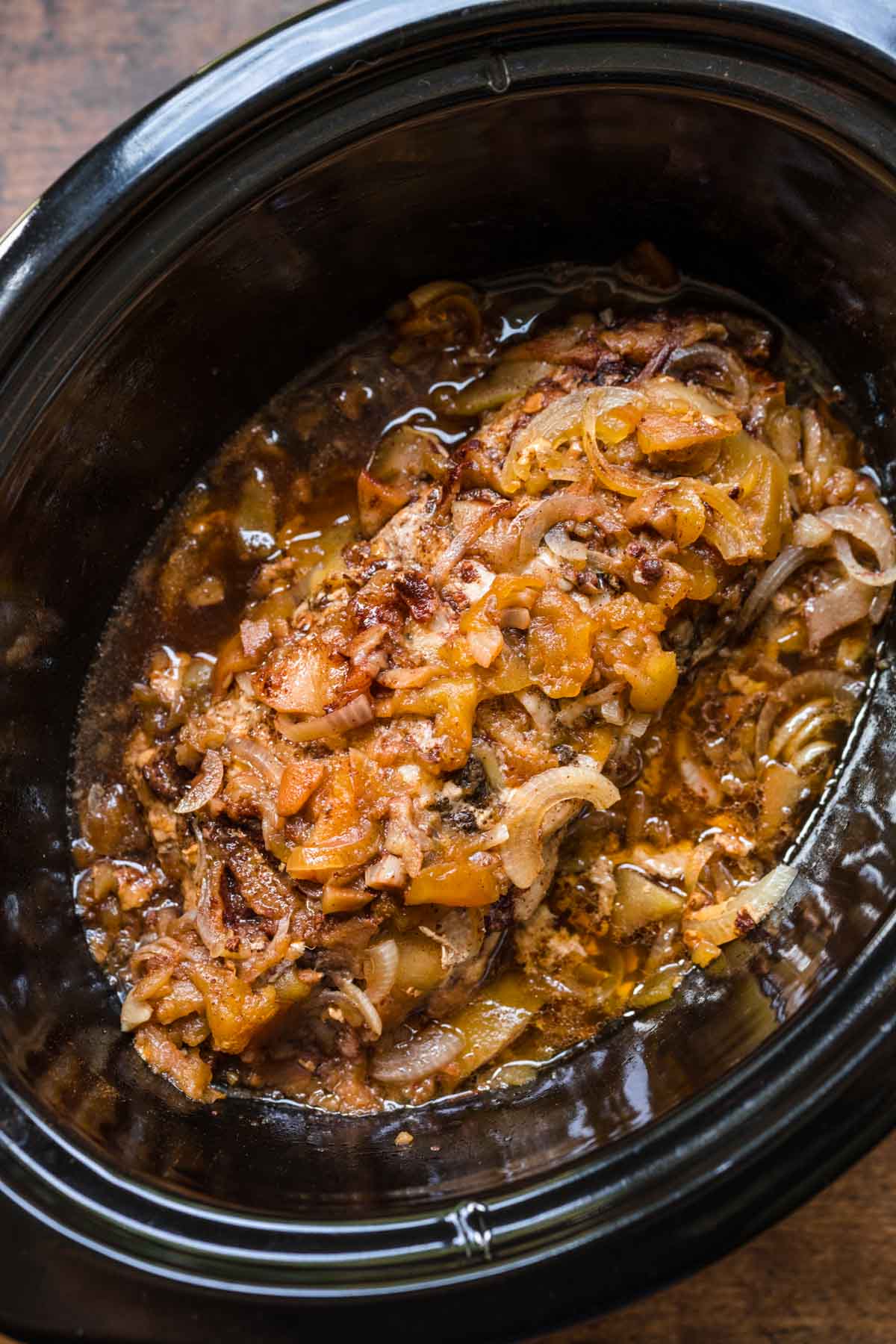 Apple Cinnamon Pork Loin in slow cooker after cooking
