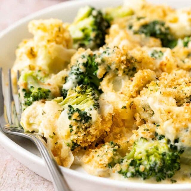 Baked Parmesan Broccoli Casserole on serving plate 1x1