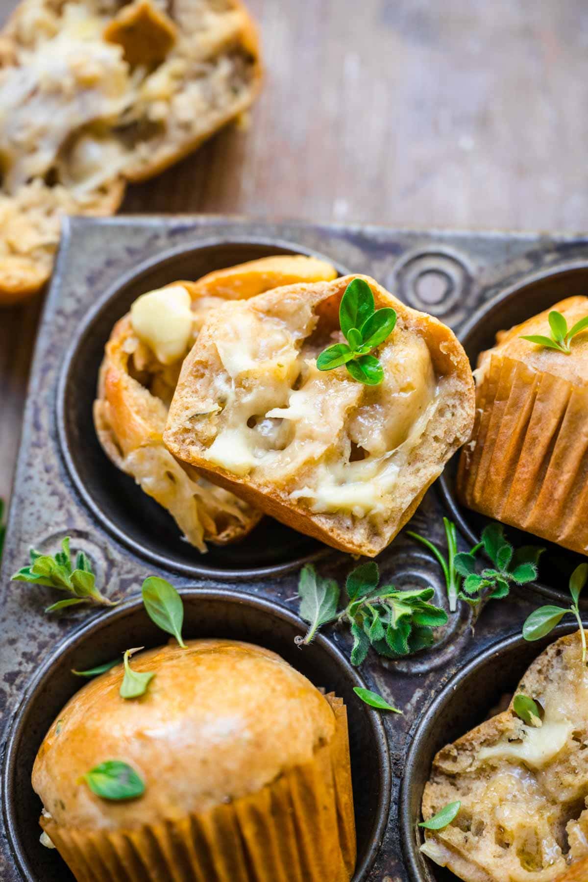 Cheesy Herb Muffins in muffin tin