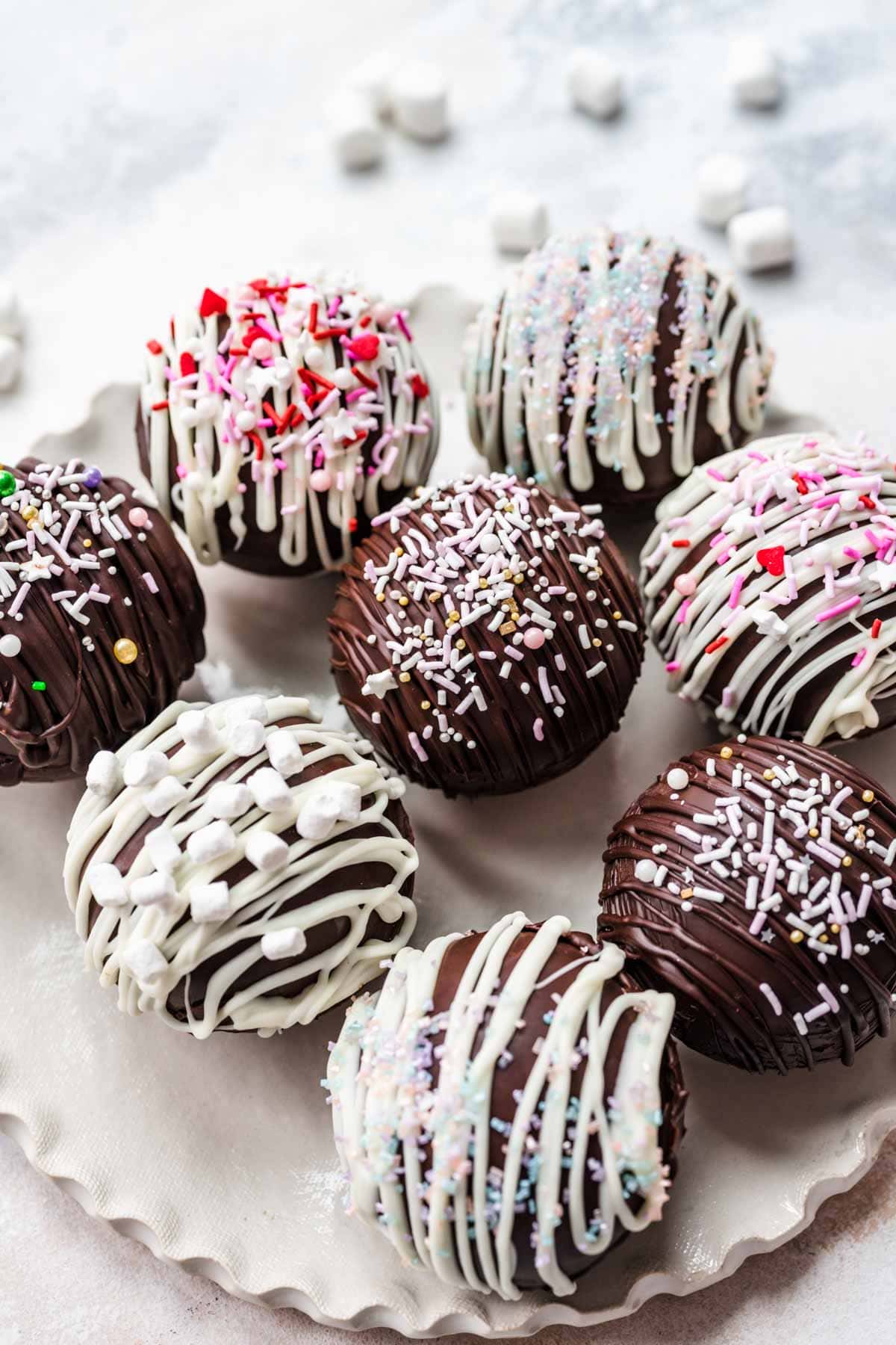 Hot Chocolate Bombs decorated on serving plate