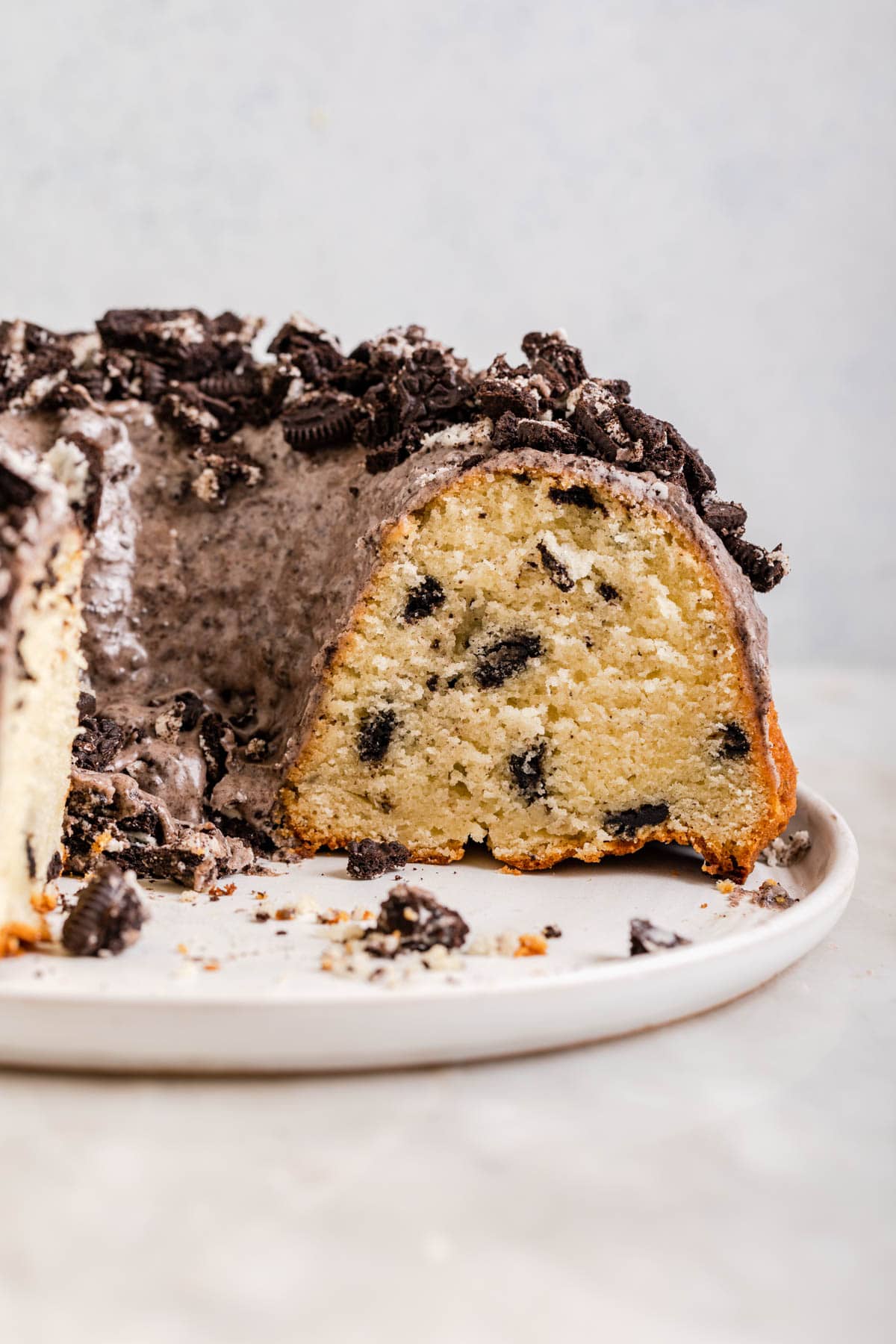 Oreo Bundt Cake cut on serving platter