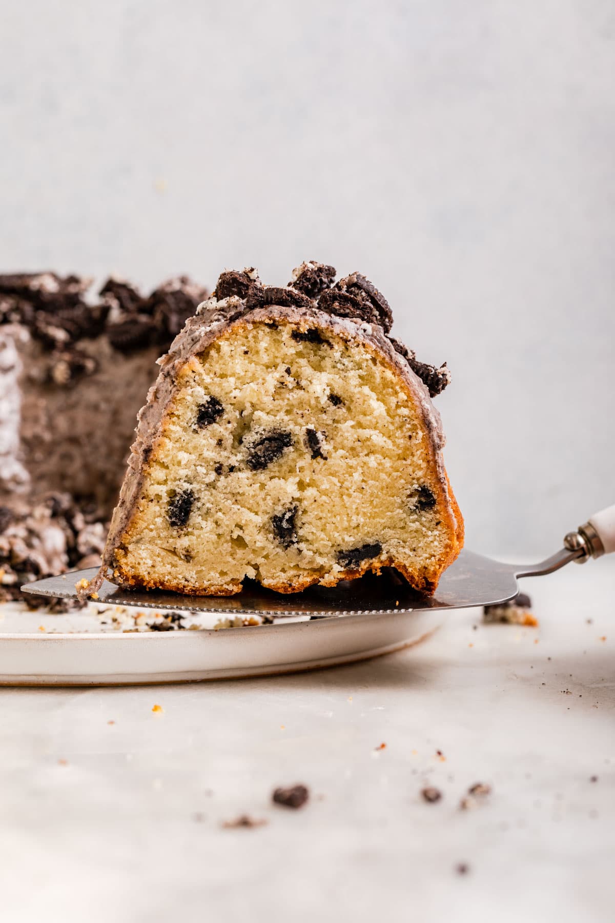 Oreo Bundt Cake cut on serving platter