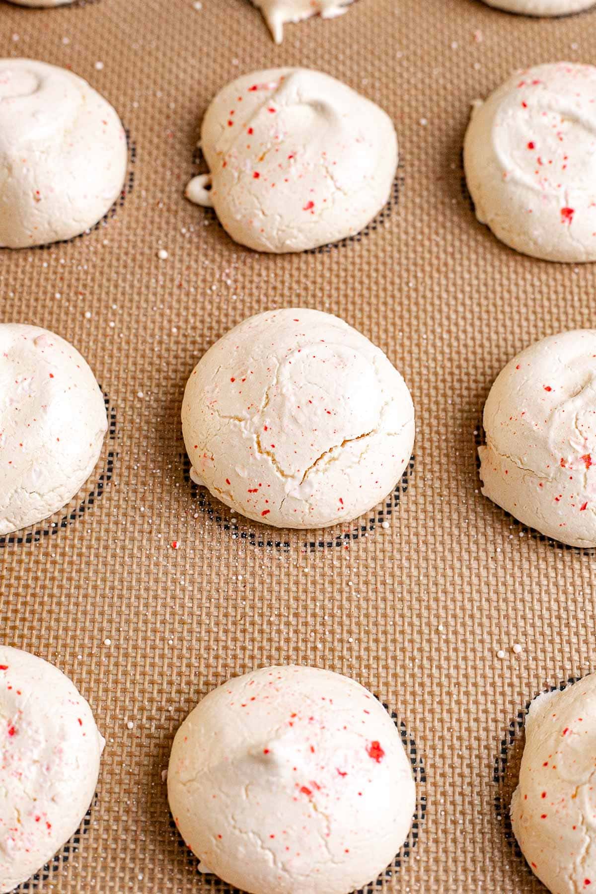 Peppermint Meringues on baking sheet after baking