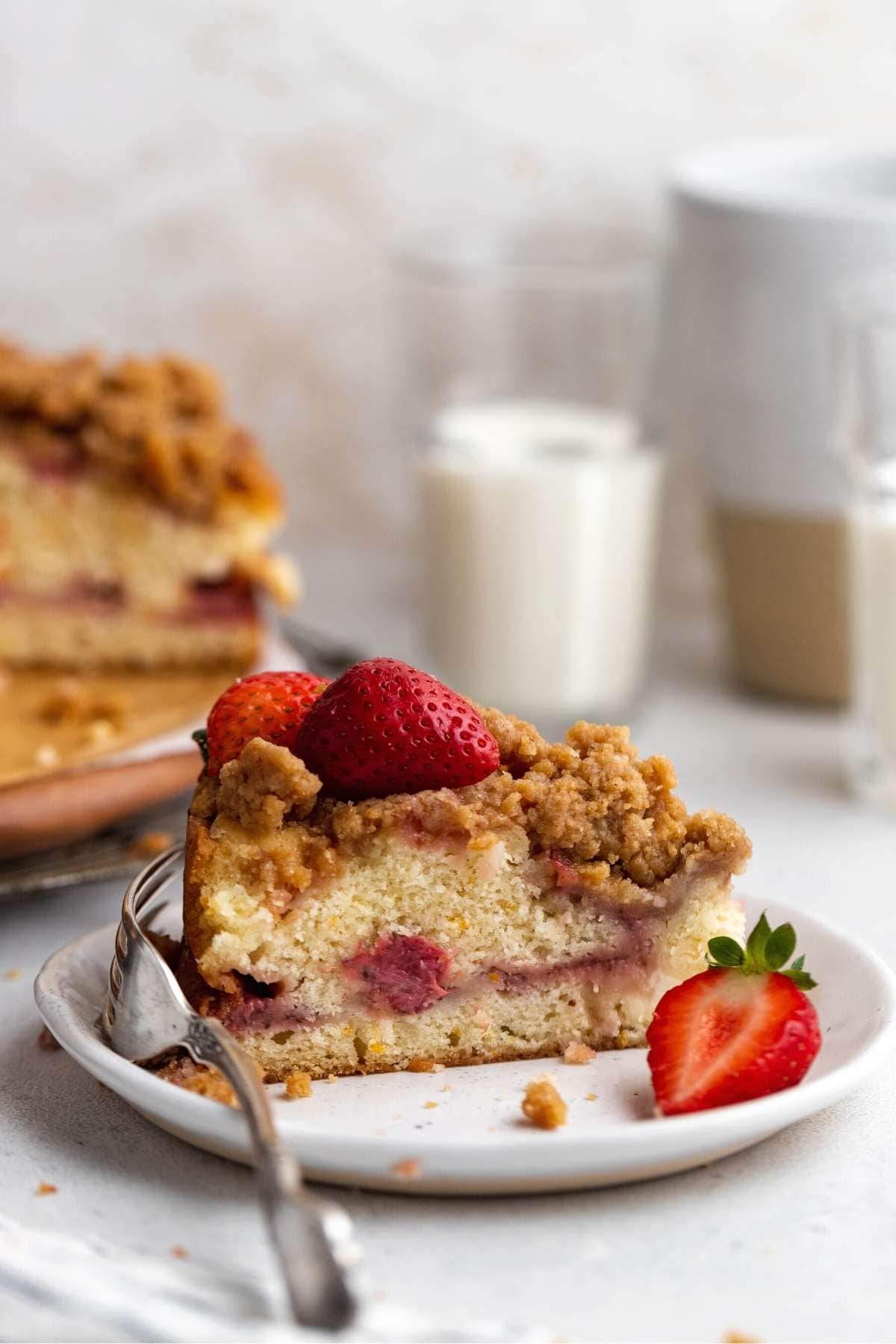 Strawberry Cream Cheese Coffee Cake slice on plate with fork
