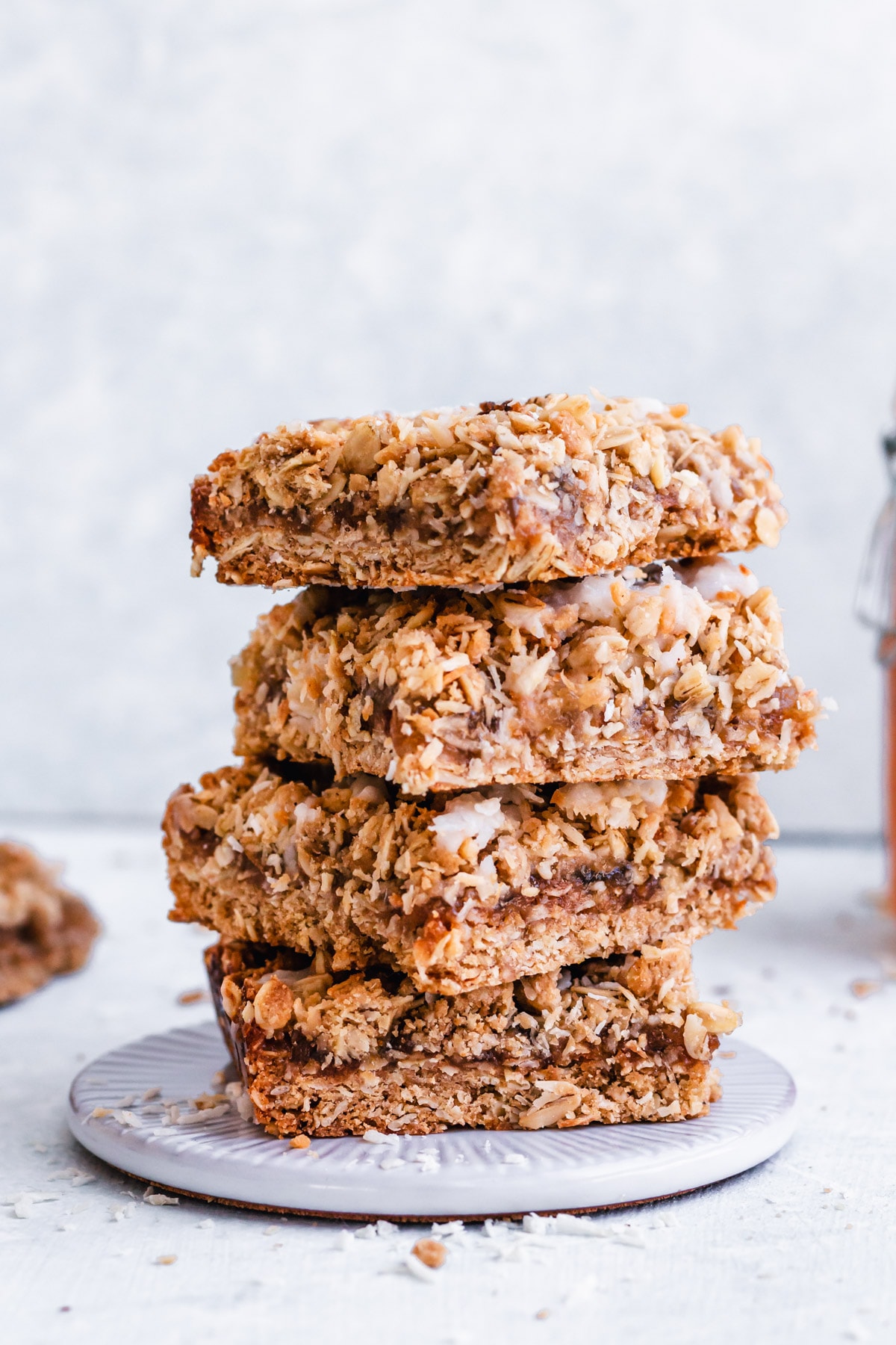 Tropical Oatmeal Bars stacked on serving plate