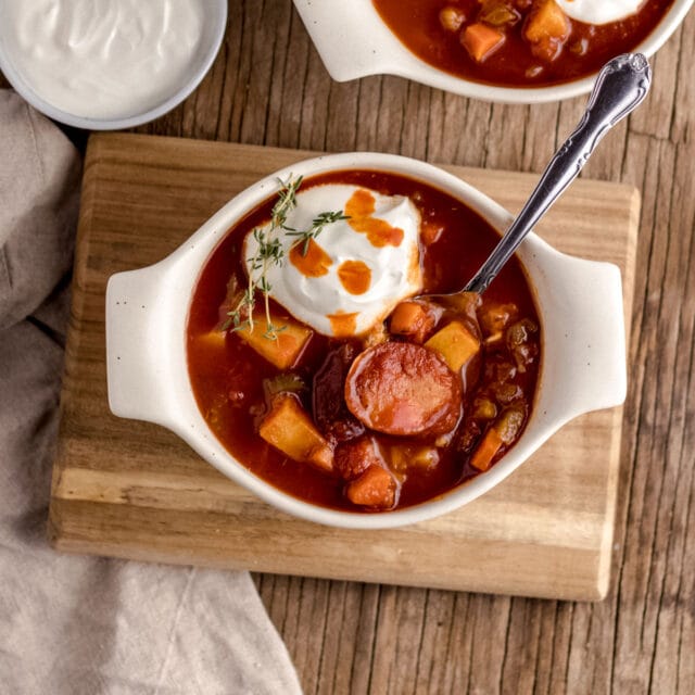 Andouille Sausage Soup in serving bowl with sour cream 1x1