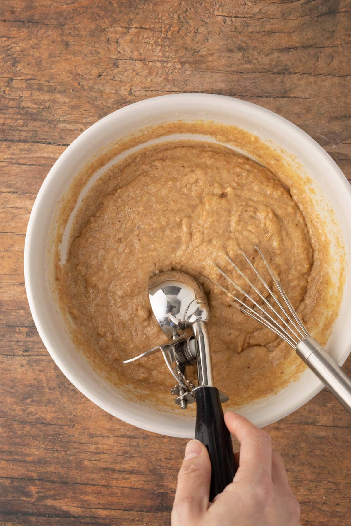 Applesauce Muffin batter being scooped