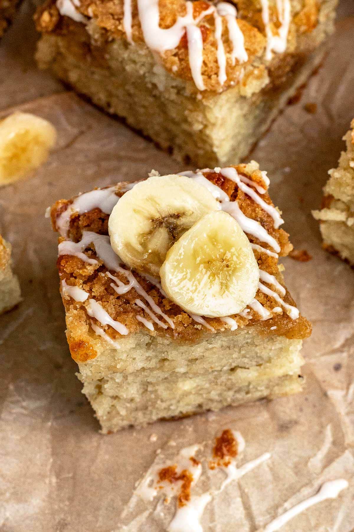 Banana Bread Crumb Cake slices on cutting board
