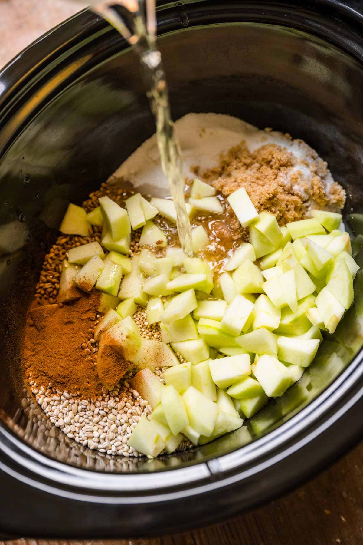 Brown Sugar Apple Whole Grains Bowl ingredients in slow cooker