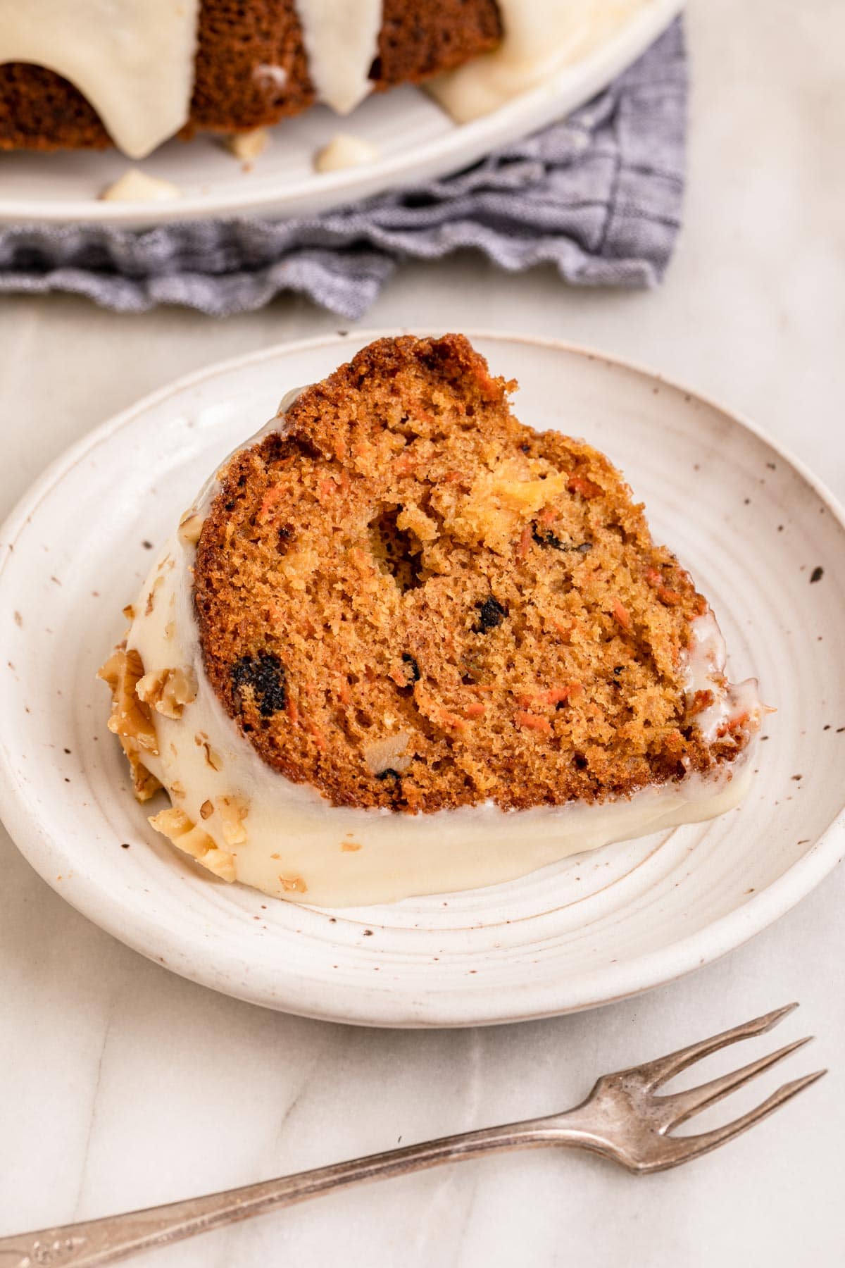 Carrot Bundt Cake slice on serving plate