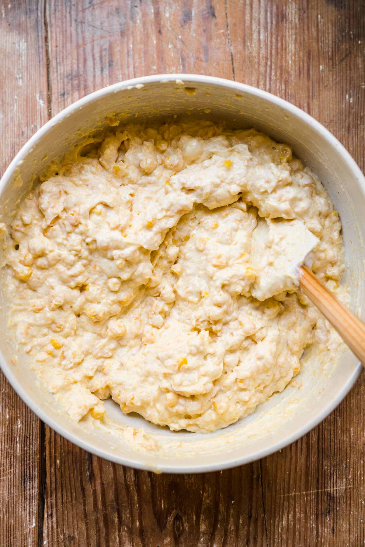 Cheesy Corn Casserole ingredients in mixing bowl