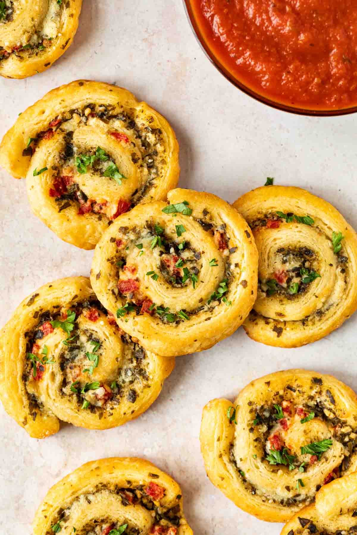 Cheesy Pesto Pinwheels in a stack