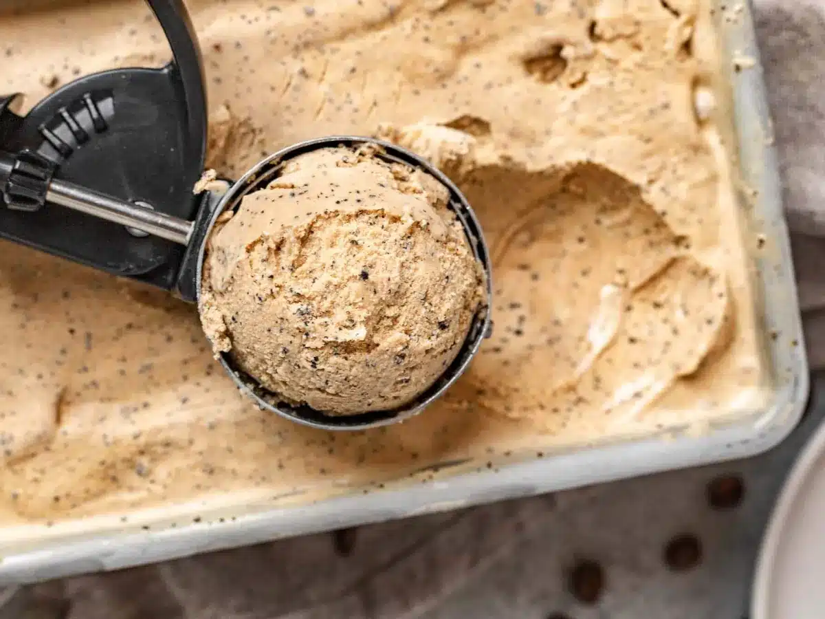 an scooper scooping out a scoop of ice cream