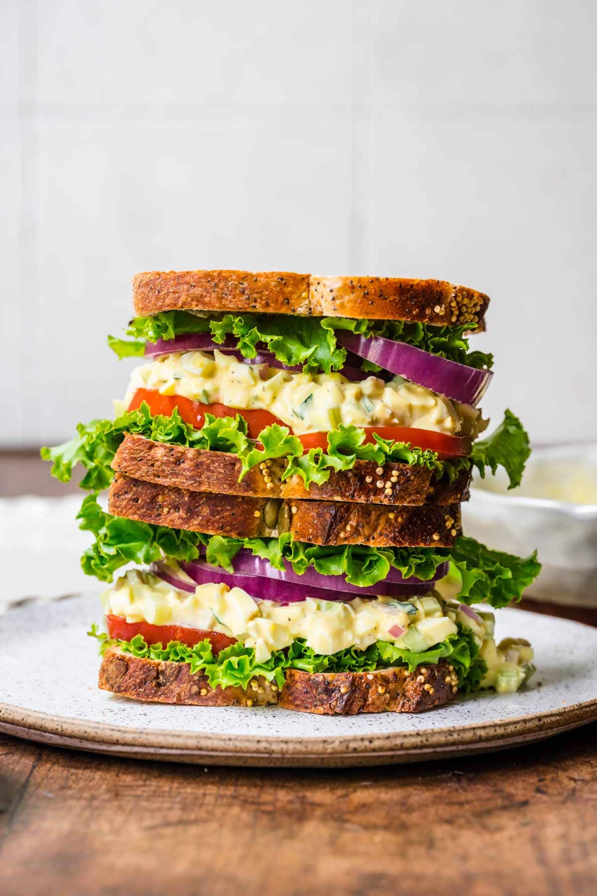 Egg Salad Sandwich stacked on serving plate