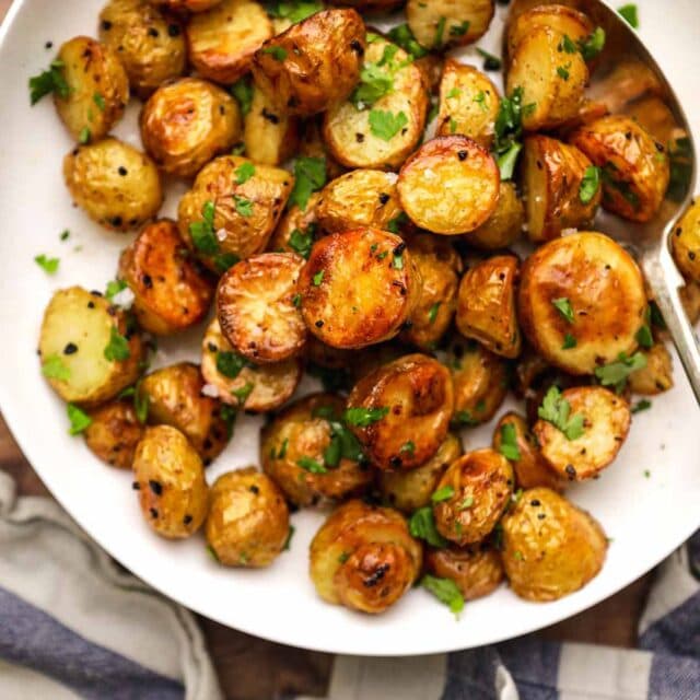 Garlic Butter Roasted Potatoes on serving plate 1x1