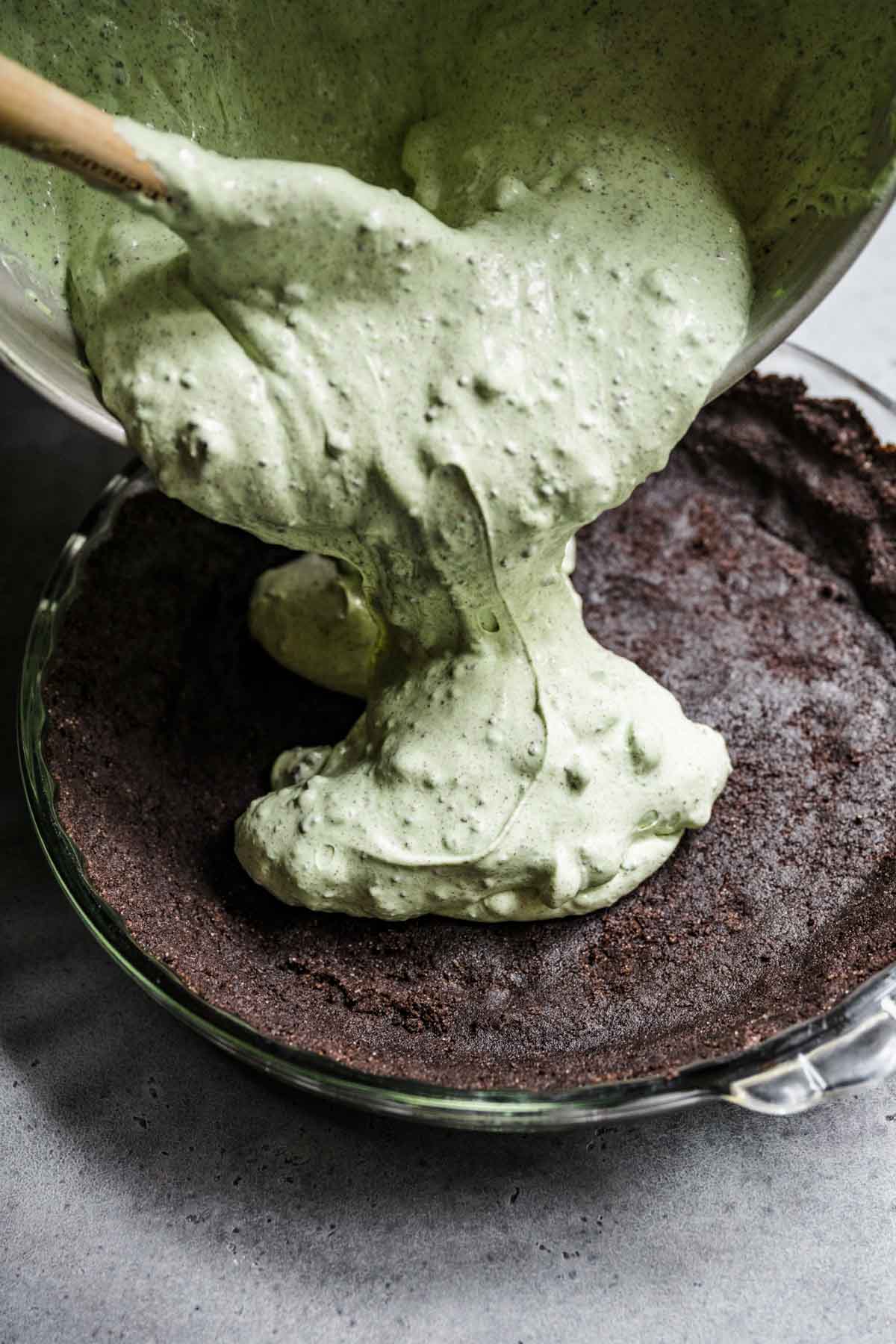 Grasshopper Pie pouring filling into crust