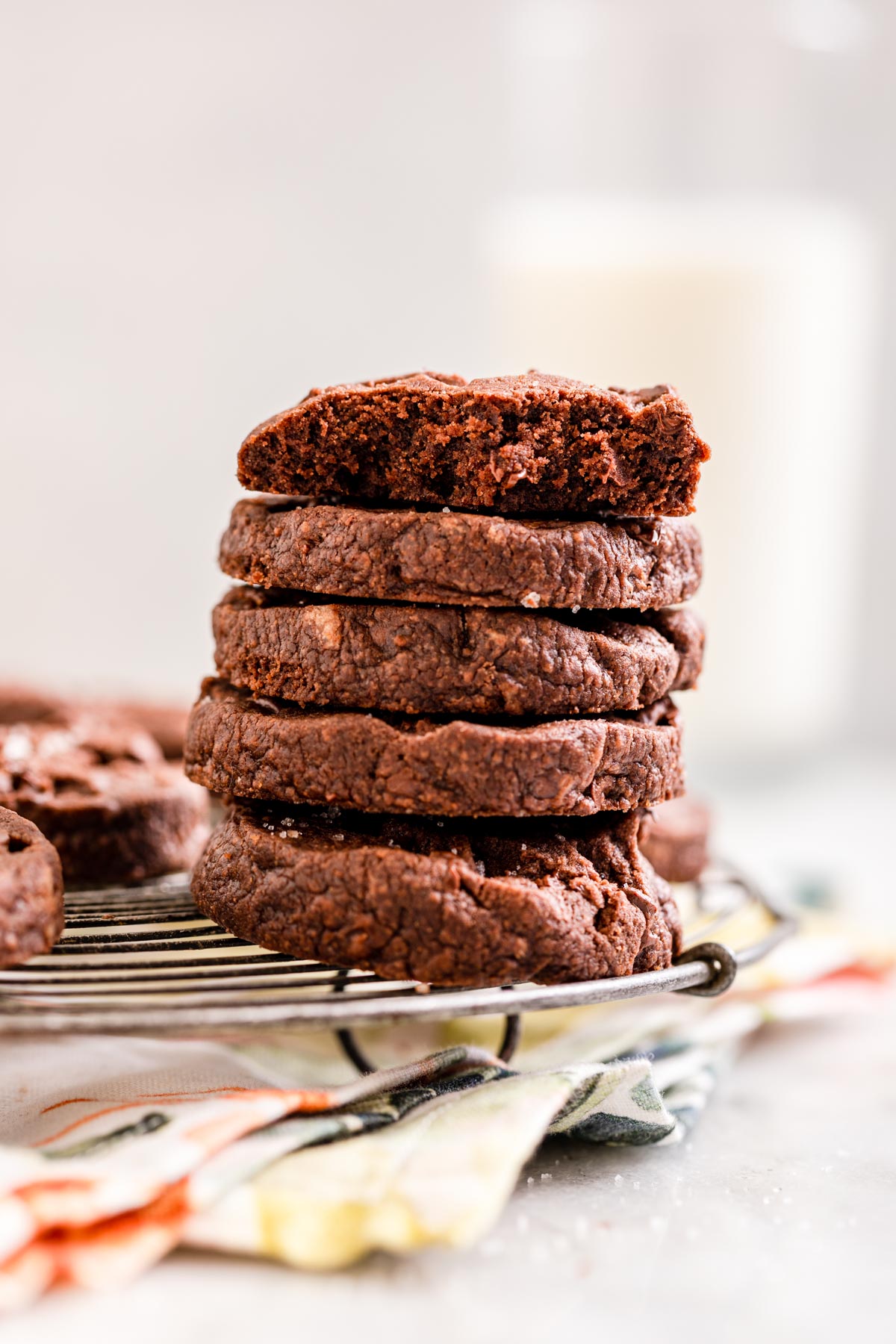 Salted Double Chocolate Shortbread Cookie stacked on cooling rack