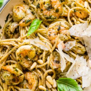 Spaghetti and pine nuts, with pesto sauce and Parmesan.