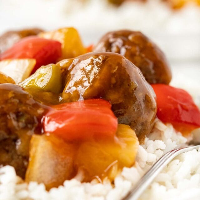 Sweet and Sour Meatballs on serving plate with rice 1x1