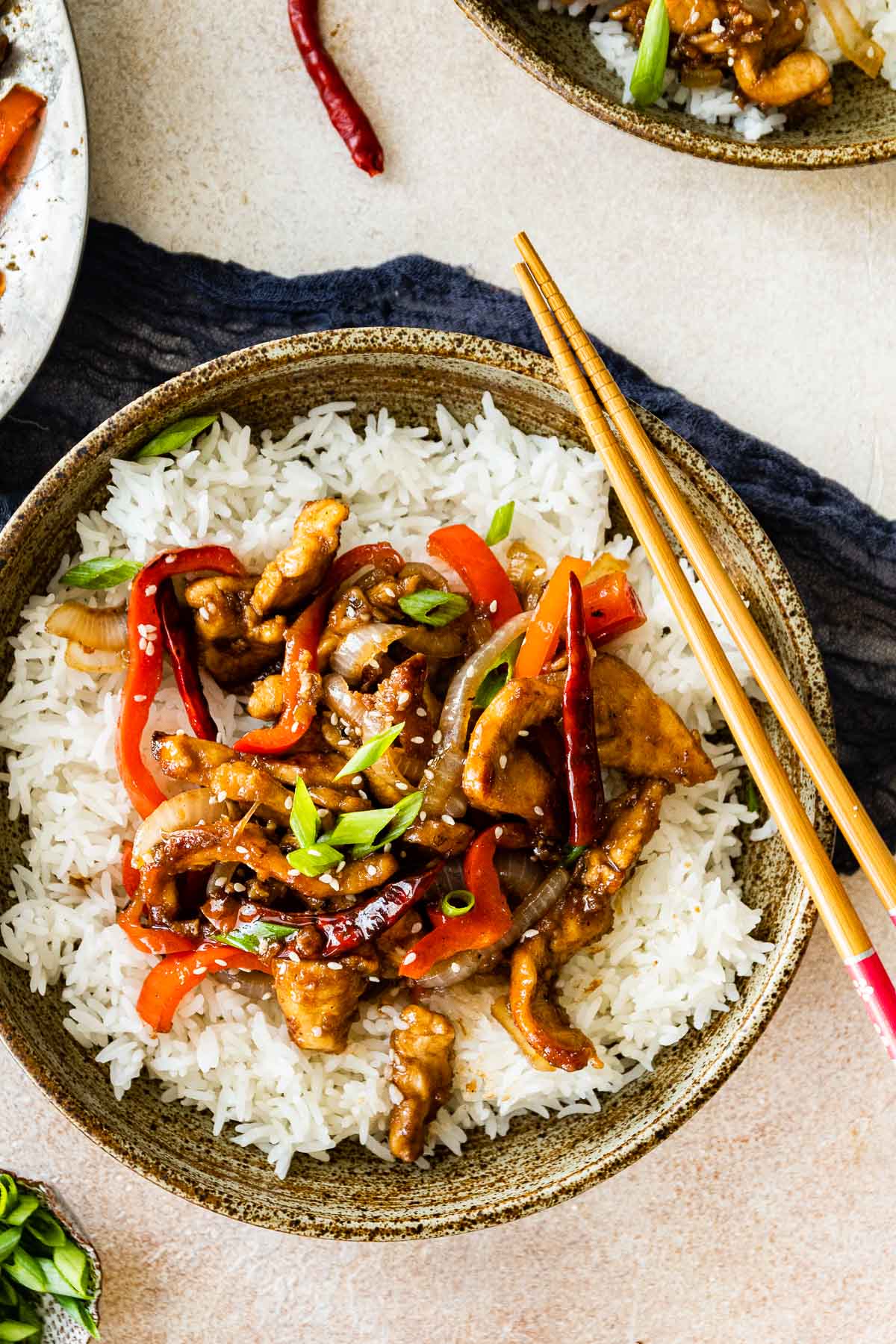 Szechuan Chicken on serving plate over rice