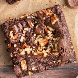 Chewy chocolate and pecan dessert square.