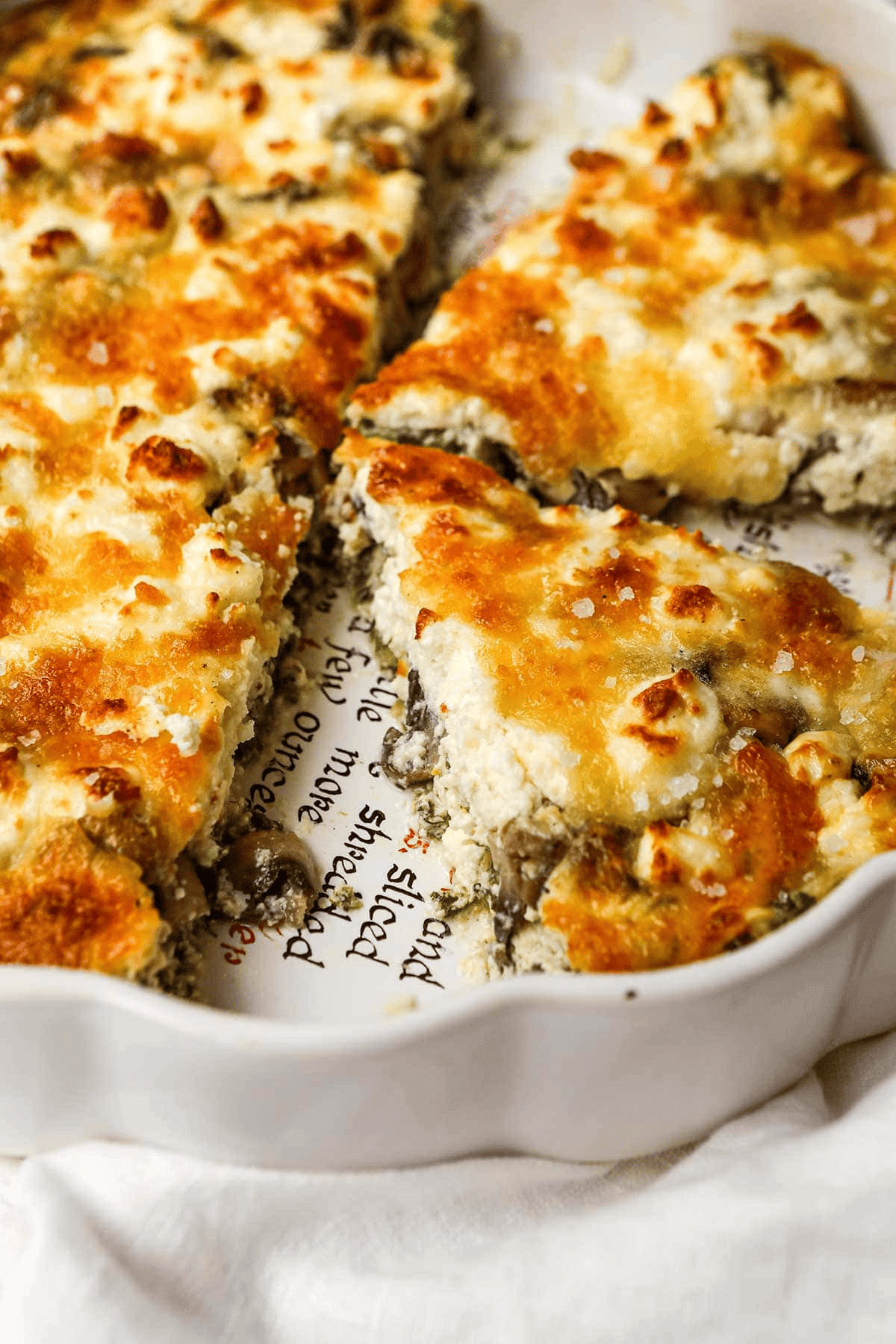 Side view of sliced quiche
