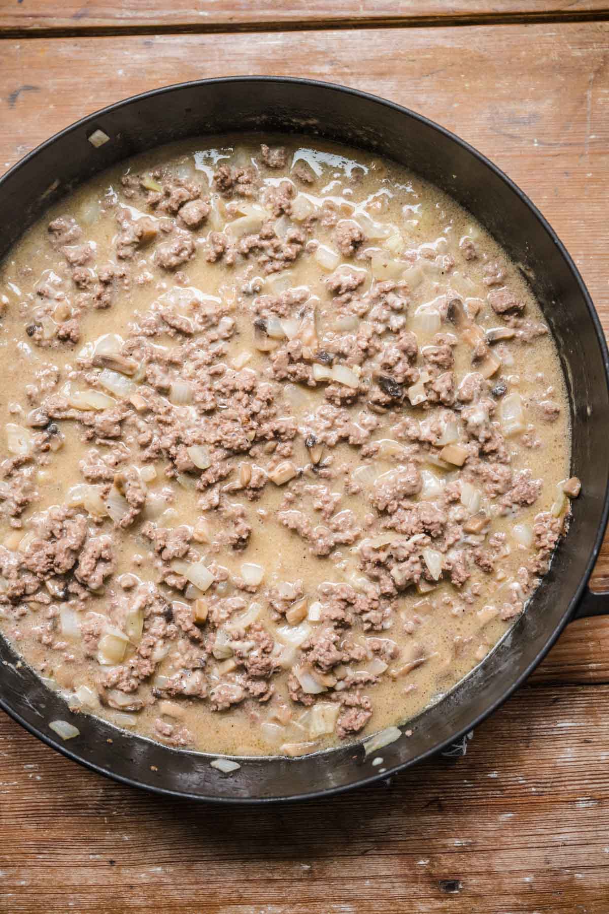 Beef Stroganoff Stuffed Peppers beef mixture in cooking pan