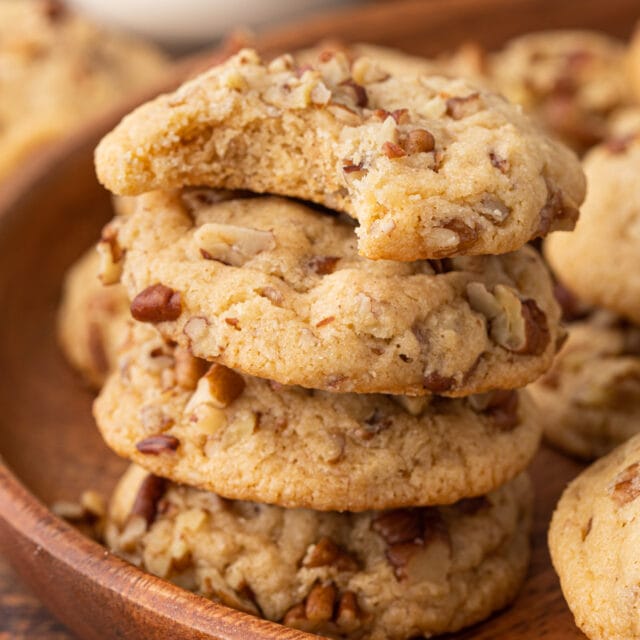 wide-angle stack of four cookies, one missing bite