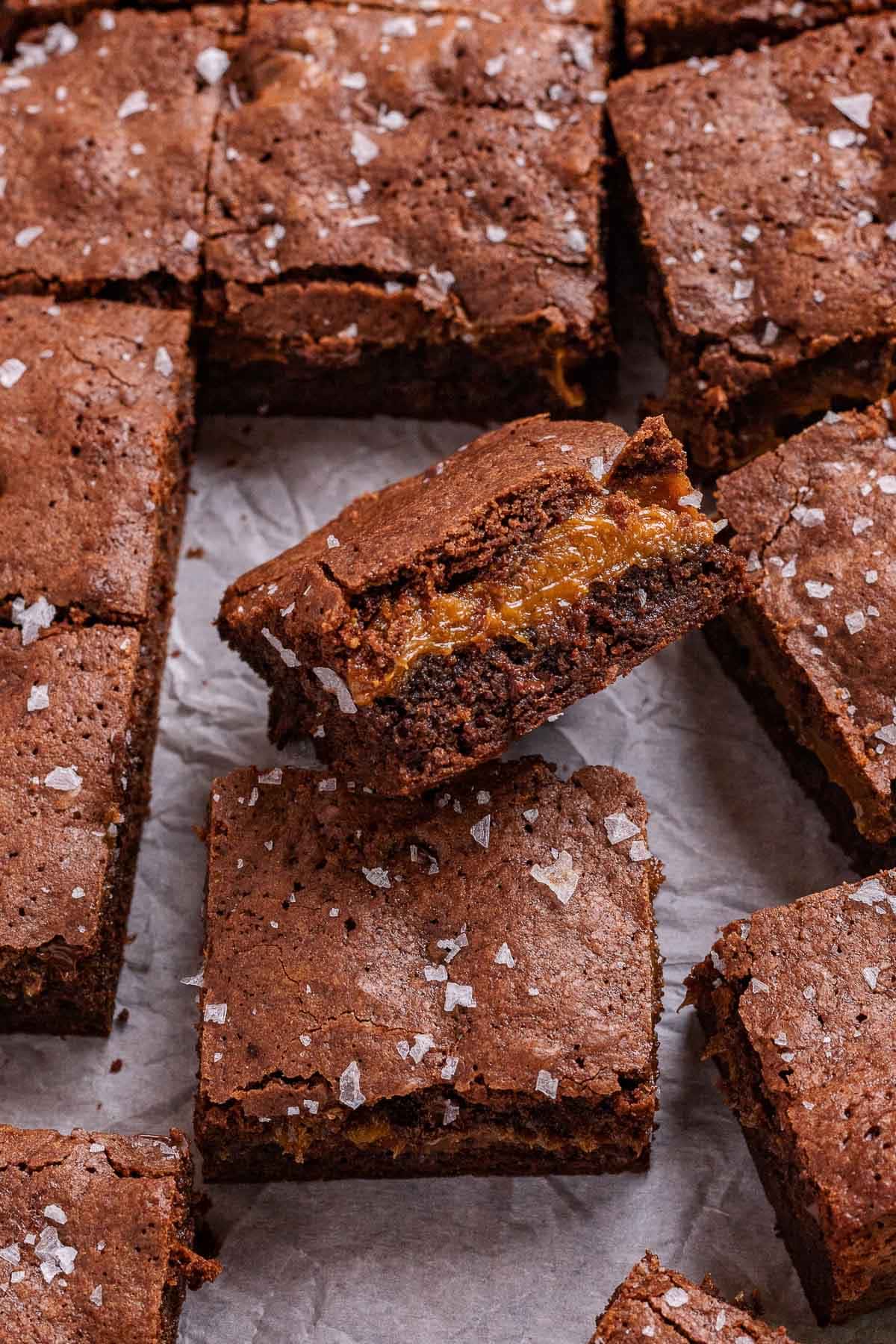 Caramel Stuffed Brownies sliced in baking pan