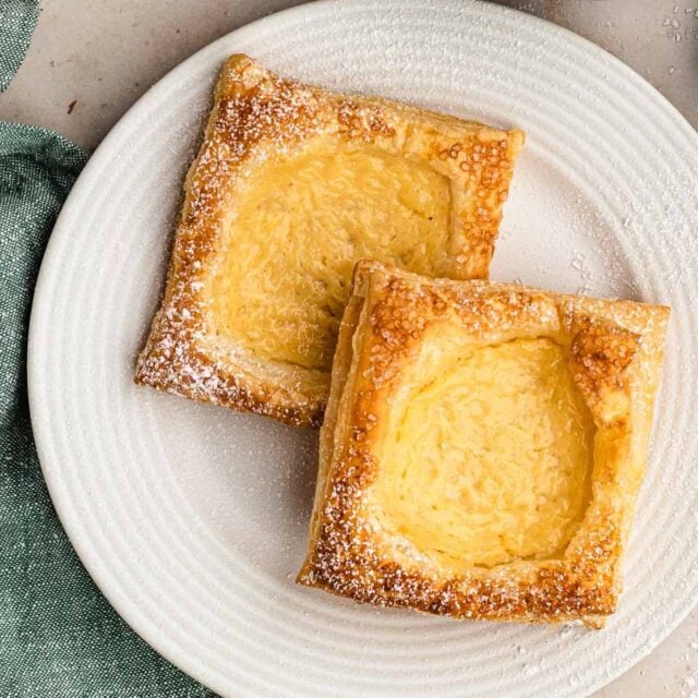 Two Danishes on a white plate