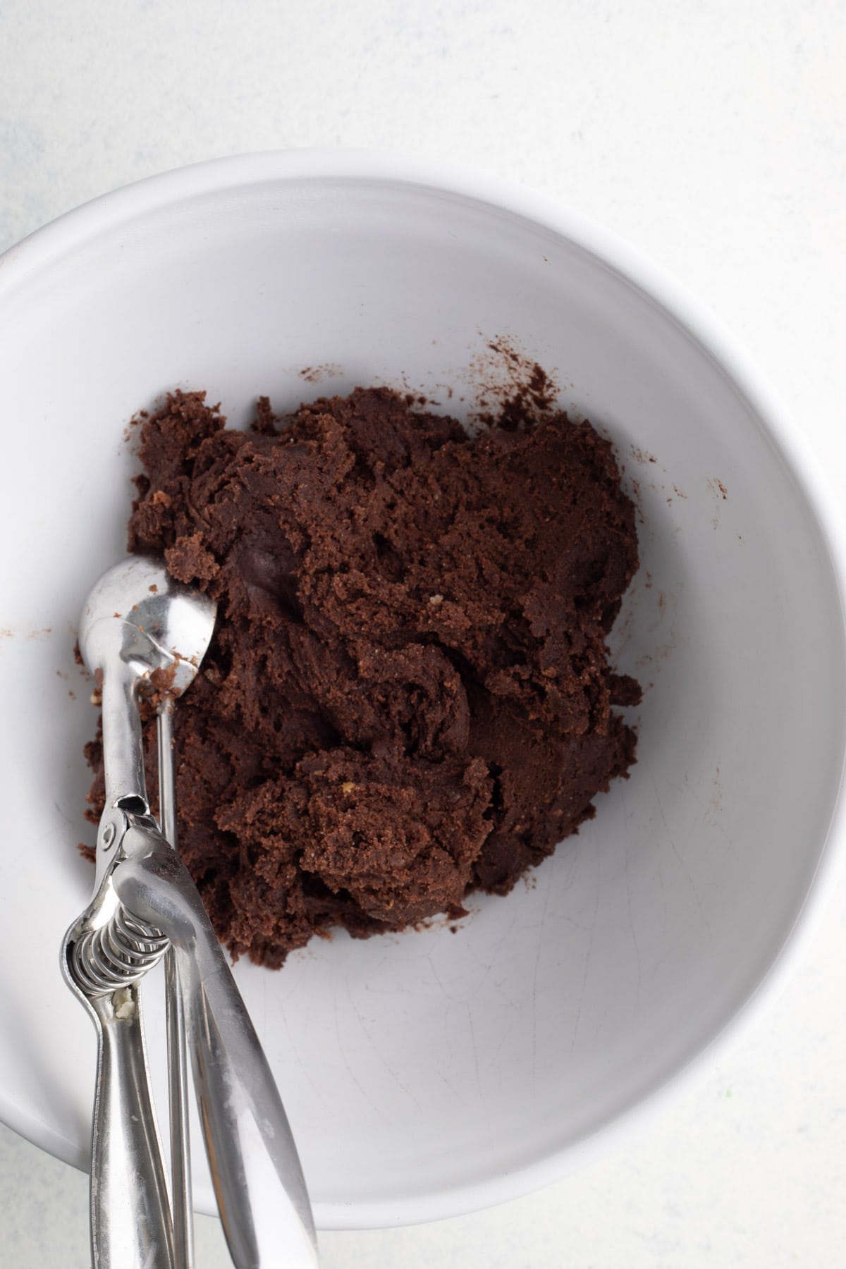 Chocolate Snowball dough in mixing bowl