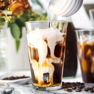 Cold Brew Coffee pouring milk into glass 1x1
