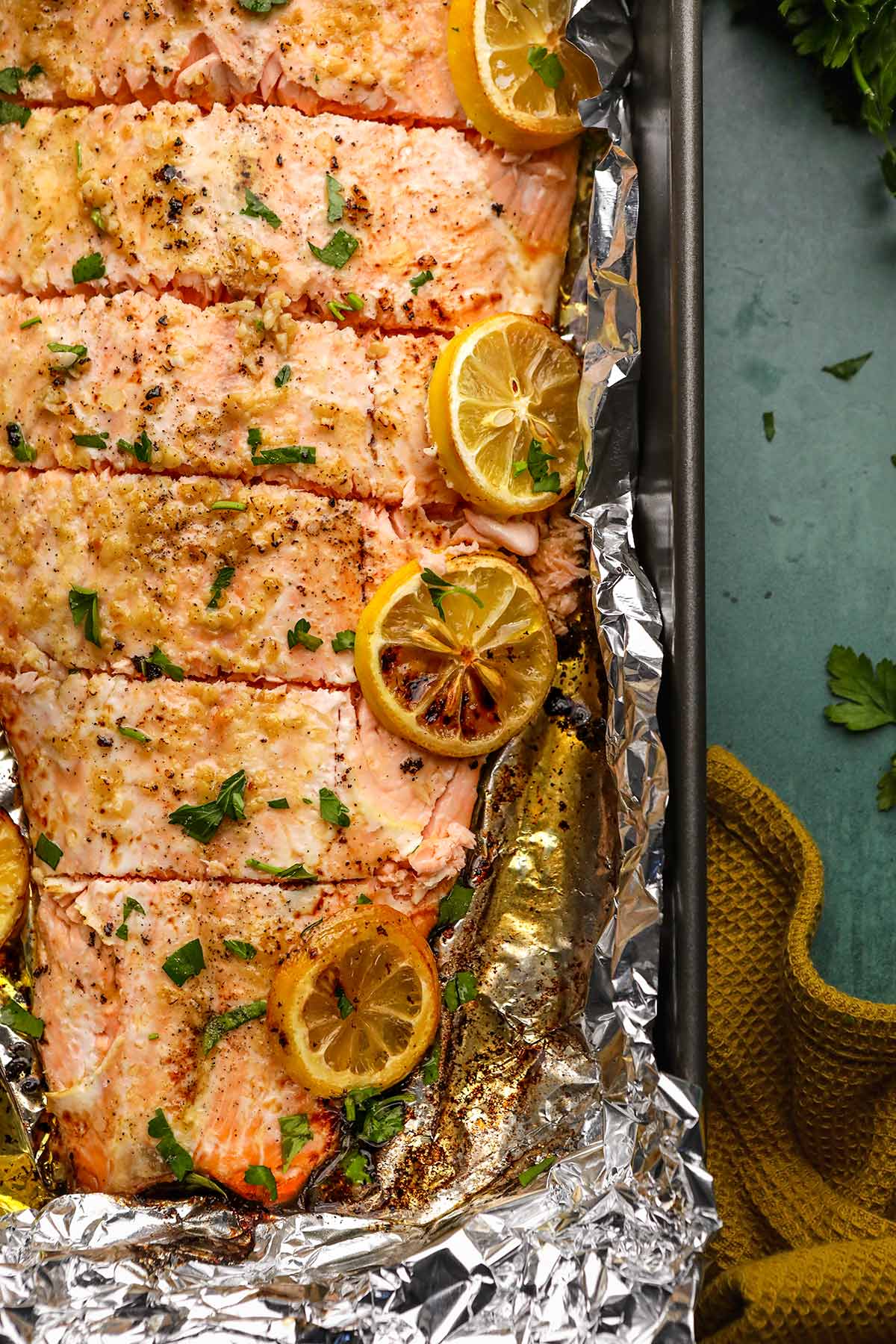 Garlic Butter Salmon sliced on baking pan