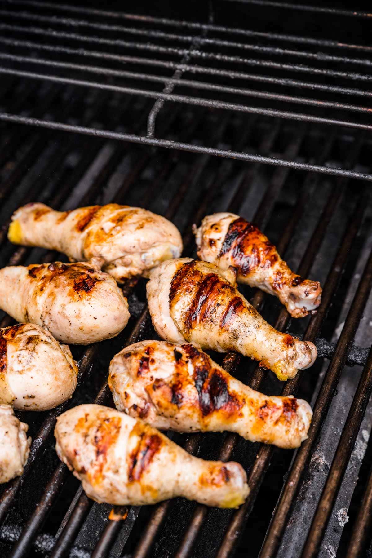 Grilled Drumsticks cooking on grill