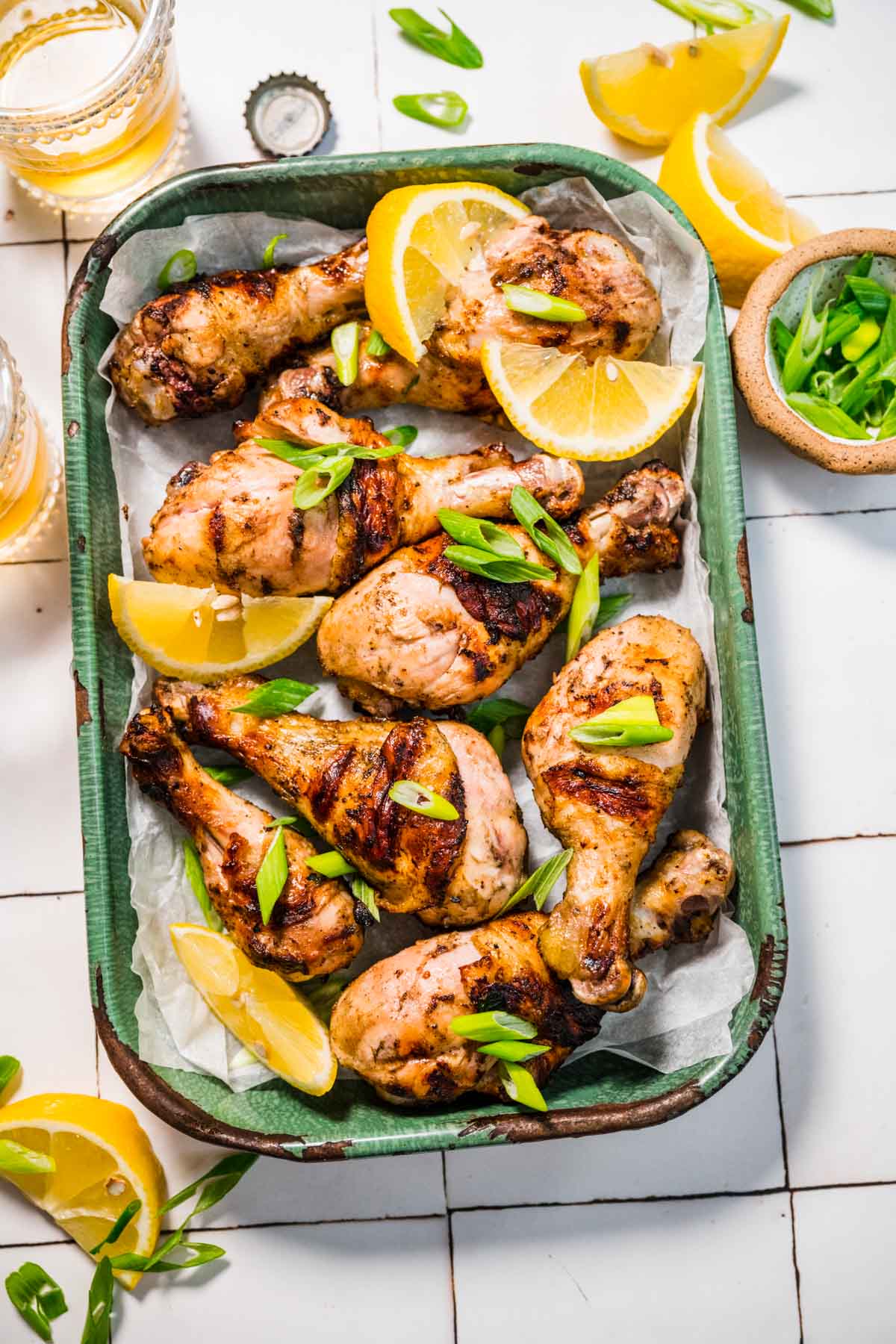 Grilled Drumsticks with garnish in serving dish