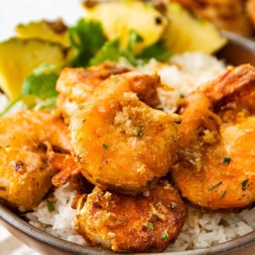 Hawaiian Garlic Shrimp on serving plate over rice 1x1