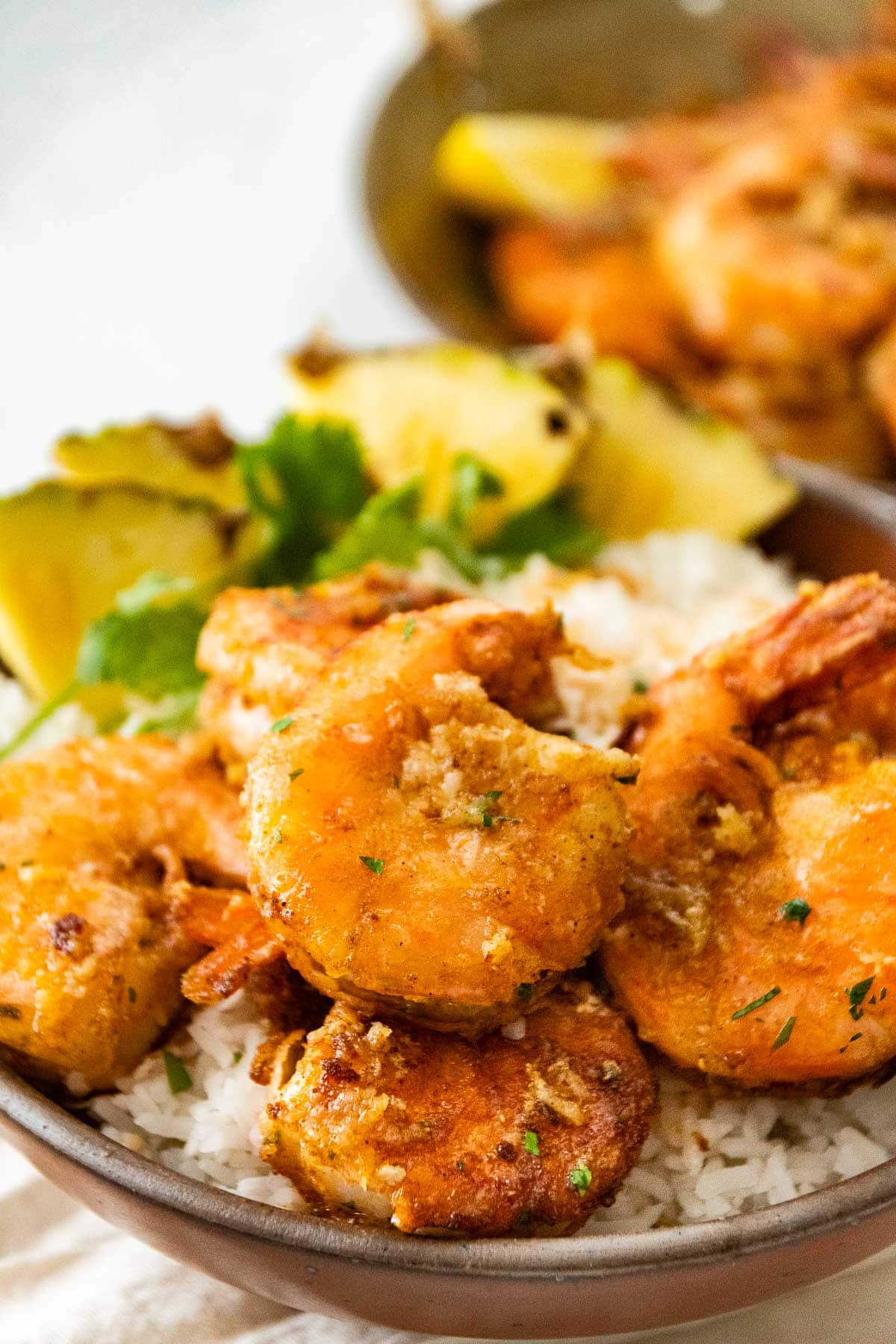 Hawaiian Garlic Shrimp on serving plate over rice