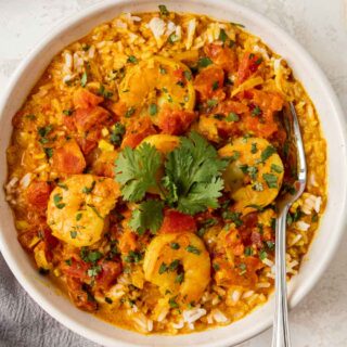 Shrimp Curry in serving bowl topped with cilantro