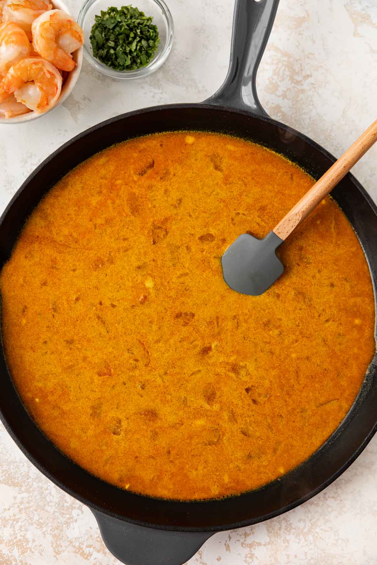 Indian Coconut Shrimp Curry ingredients in cooking pan