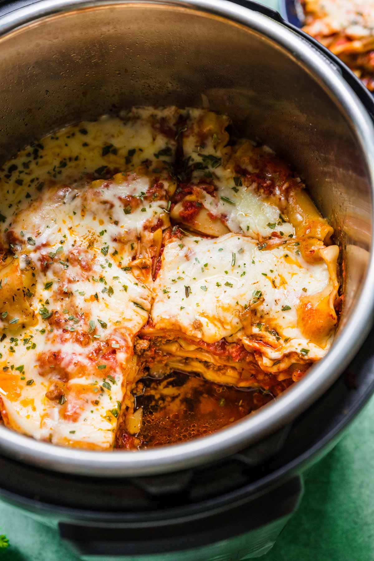 Instant Pot Beef Lasagna in instant pot with slice removed