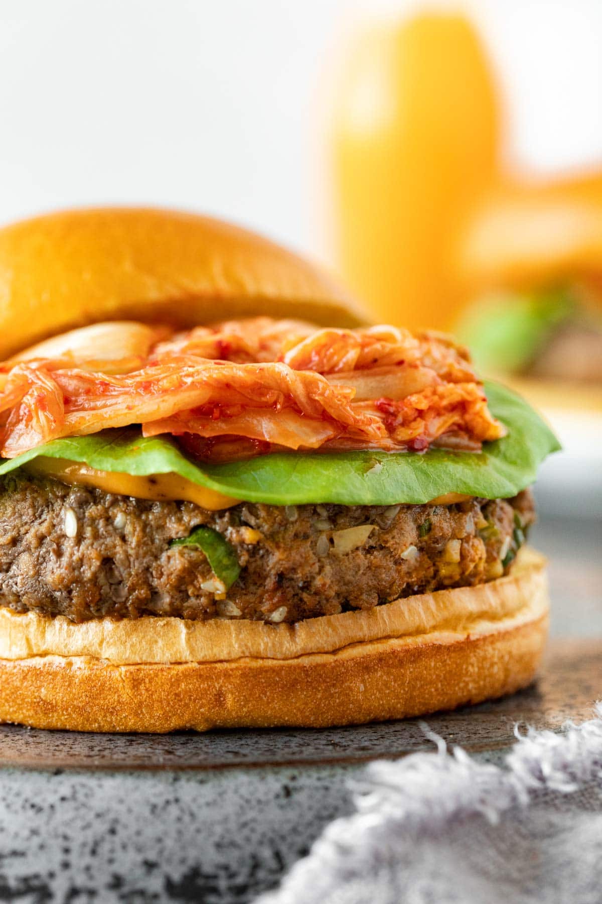 Korean Beef Bulgogi Burger on countertop with top bun off