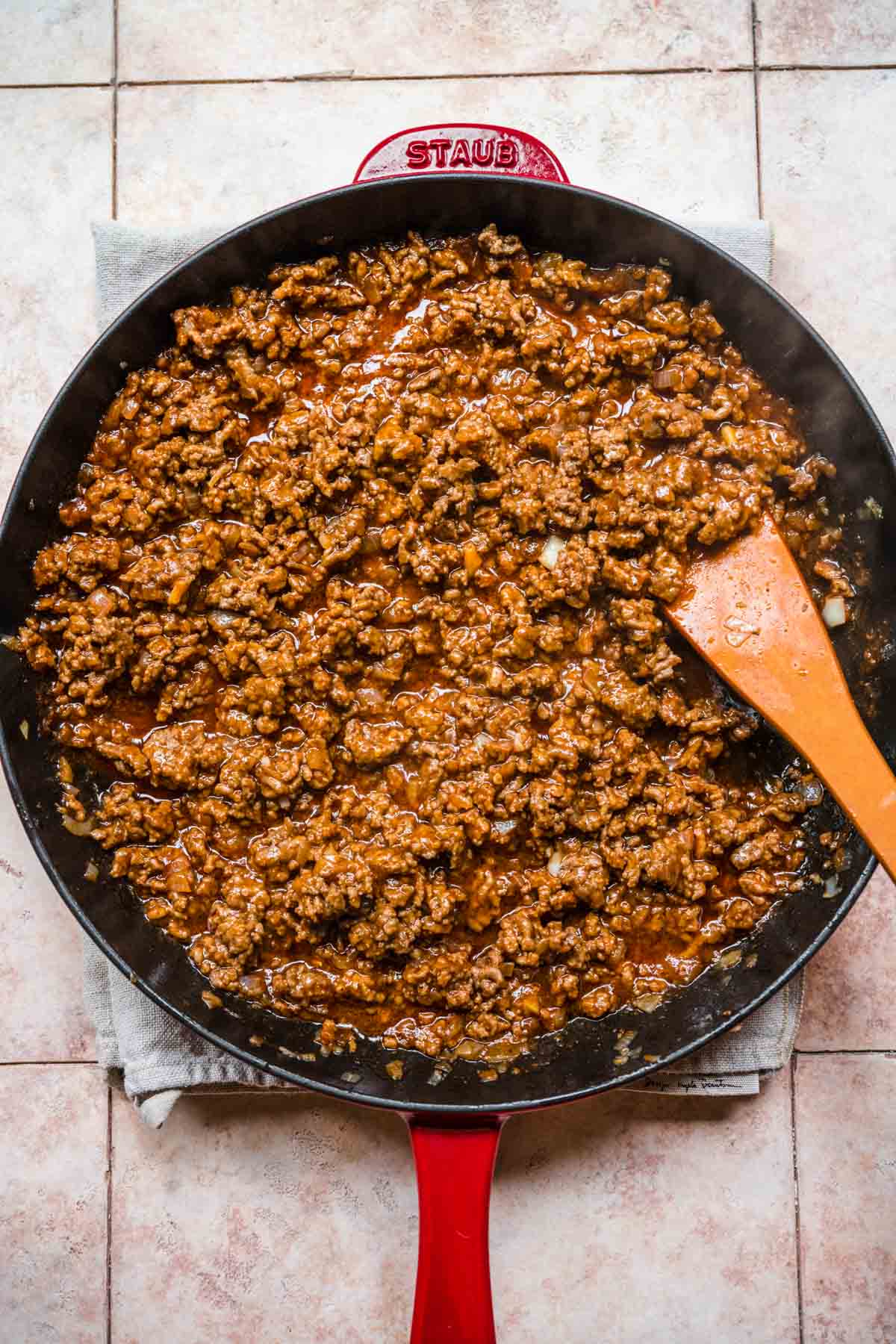 Korean Beef Stuffed Peppers ground beef and spices in cooking pan