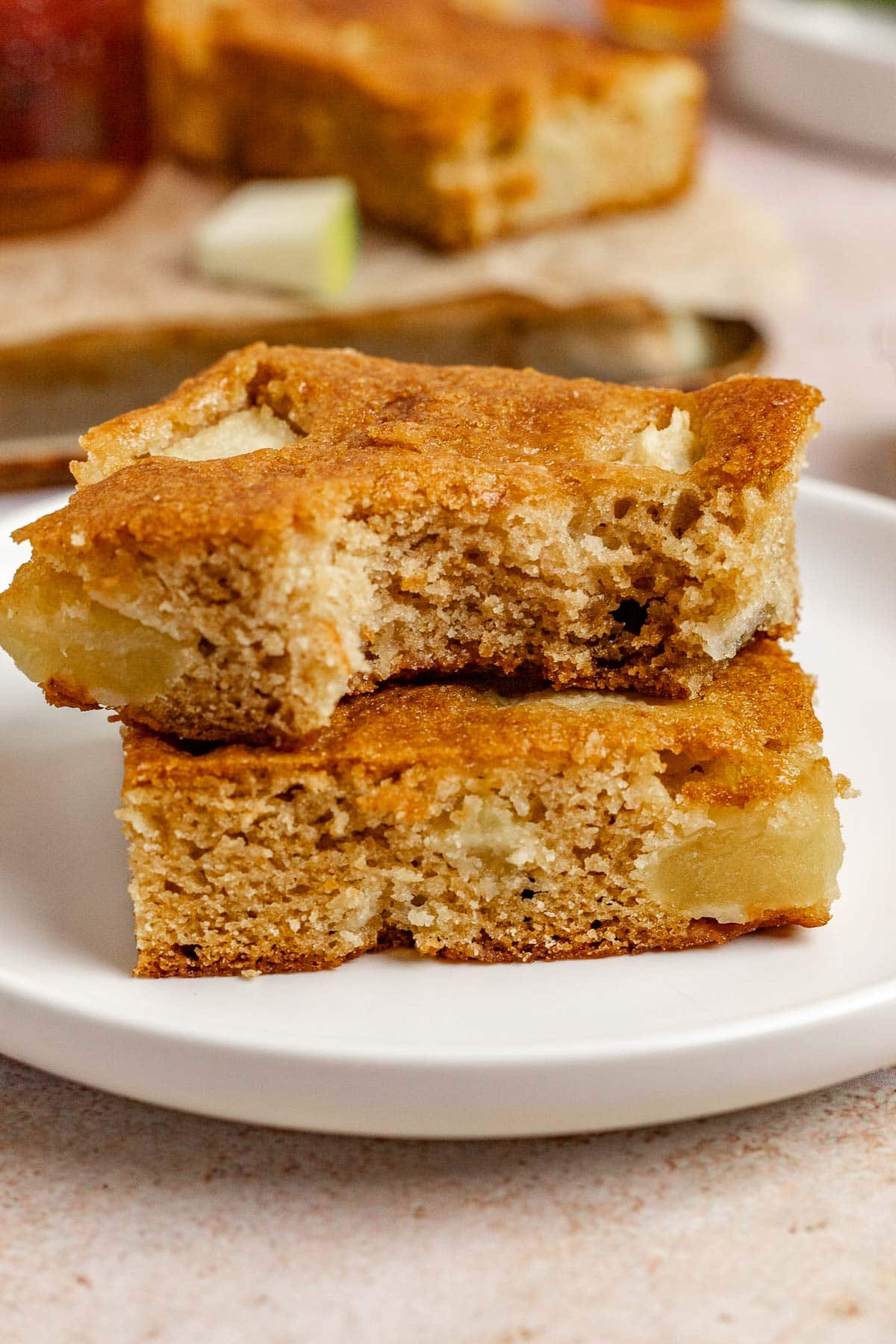 Maple Apple Bars stacked on serving plate showing interior