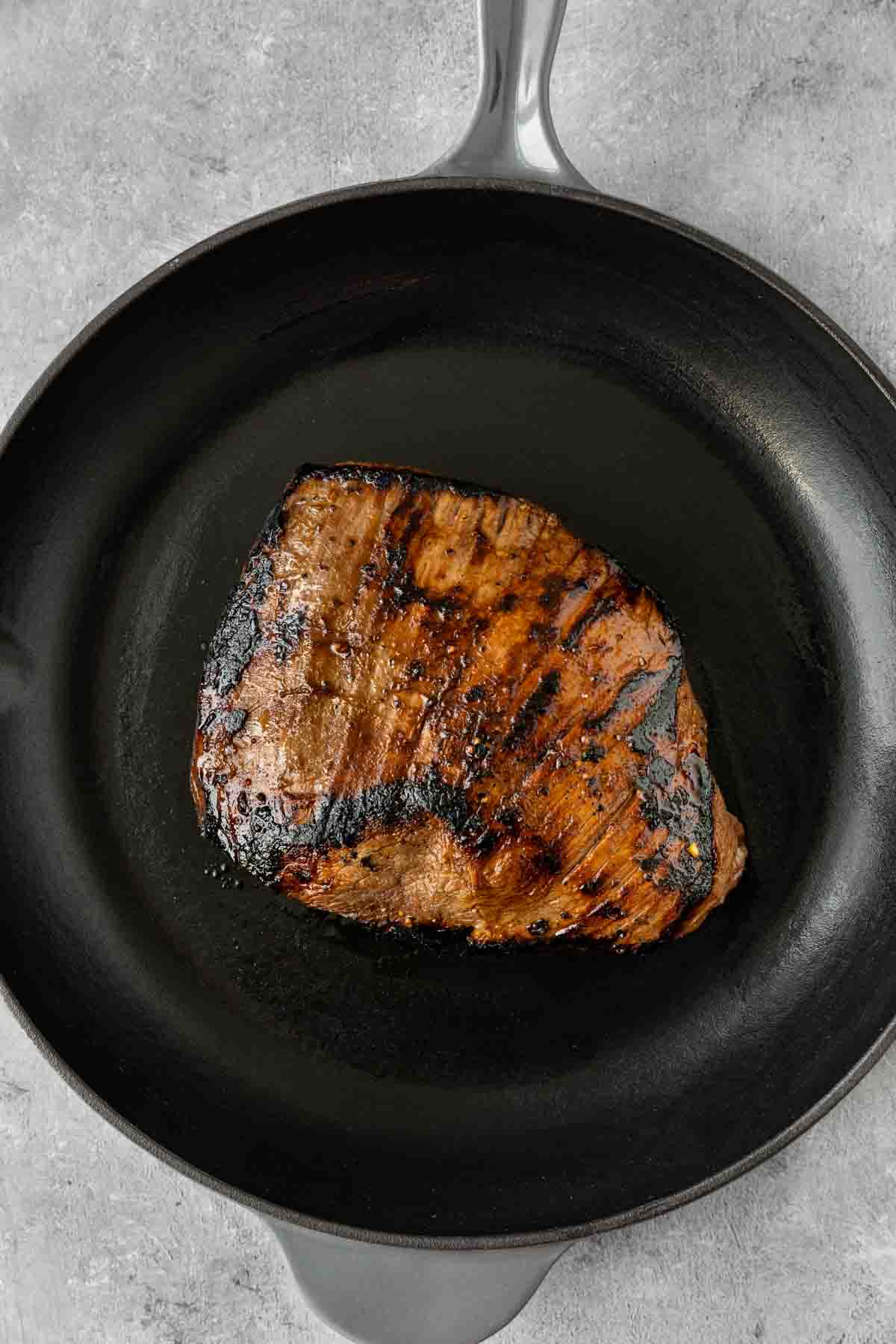 Flank steak in cast iron outlet skillet