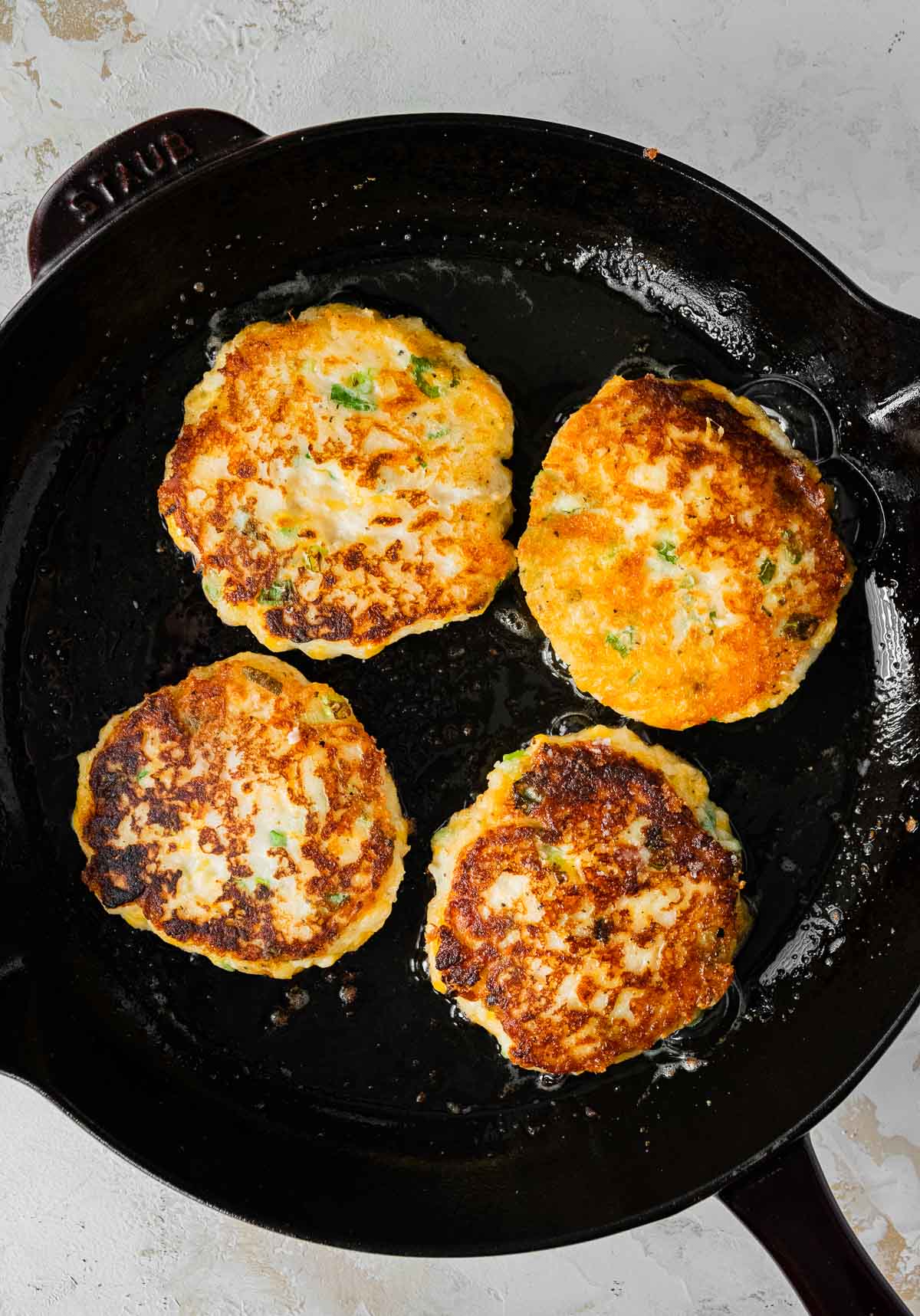 Mashed Potato Pancakes in frying pan