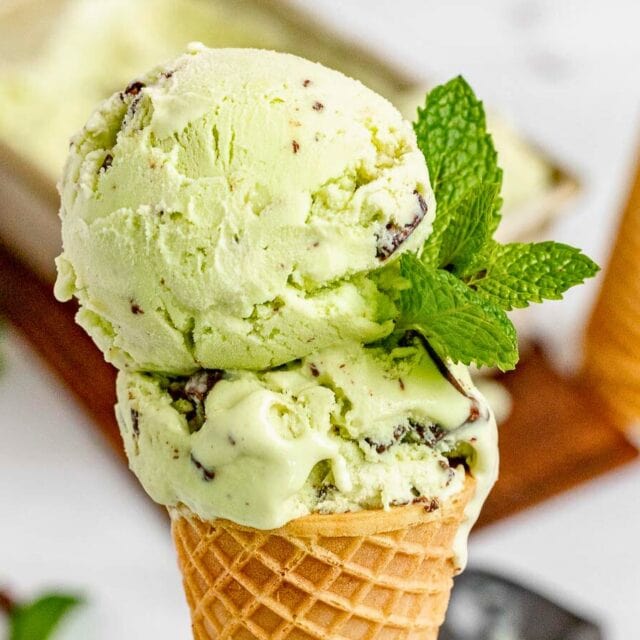 Two scoops of homemade ice cream in a sugar cone