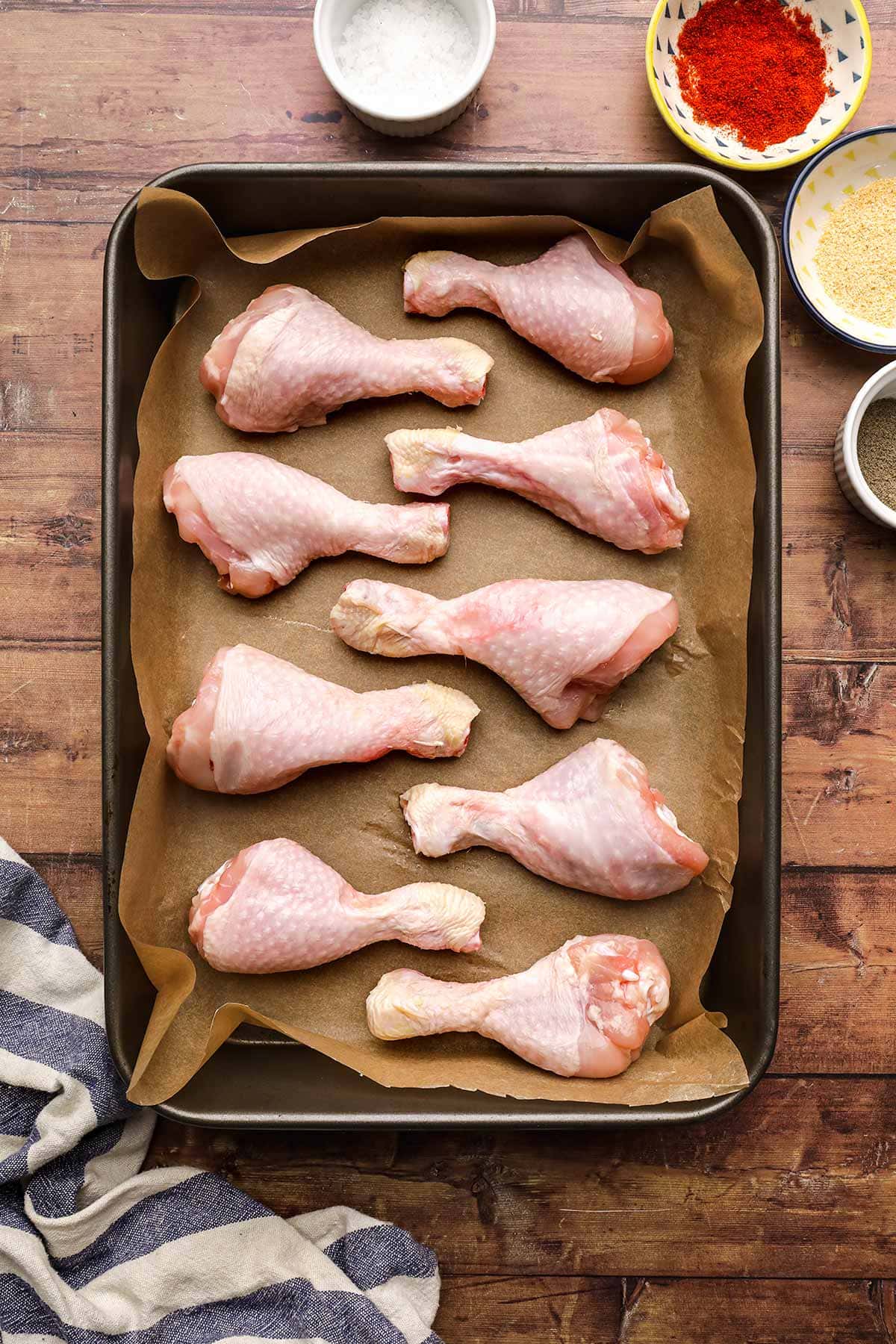 Oven Baked Chicken Drumsticks on baking pan before baking