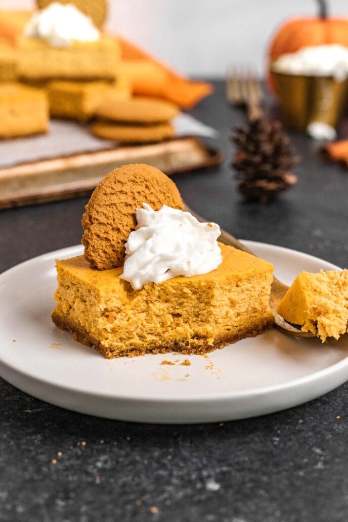 Pumpkin Cheesecake Bars on a plate