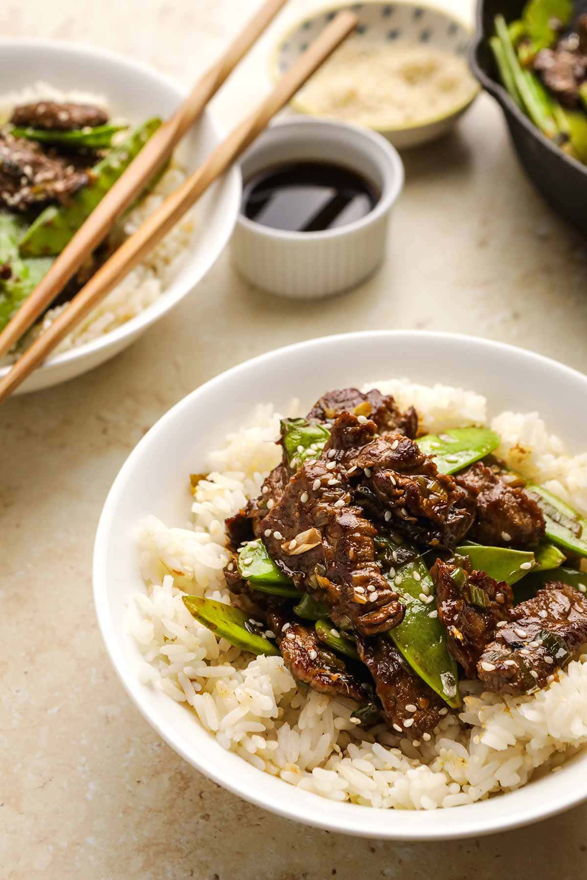 Spicy Garlic Beef Stir Fry on serving plate over rice