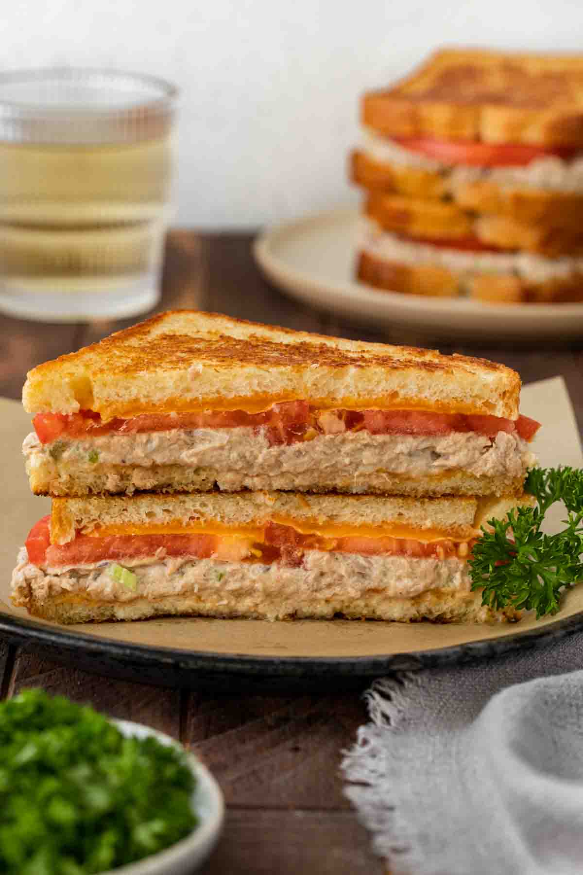 Classic Tuna Melt sandwich sliced on plate